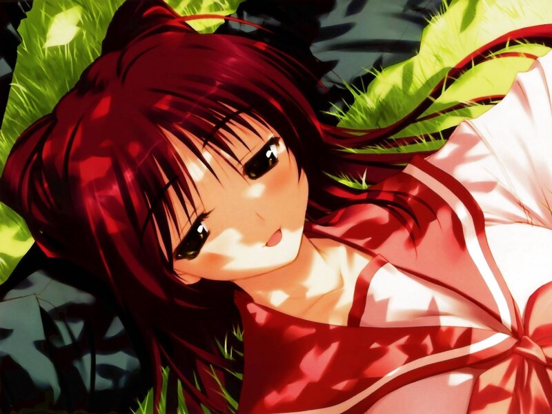 red-haired girl in grass