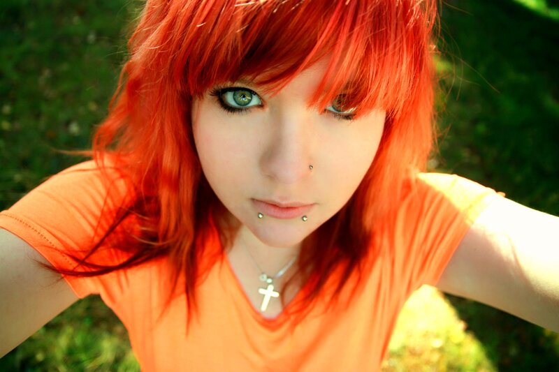 red-haired girl in orange shirt