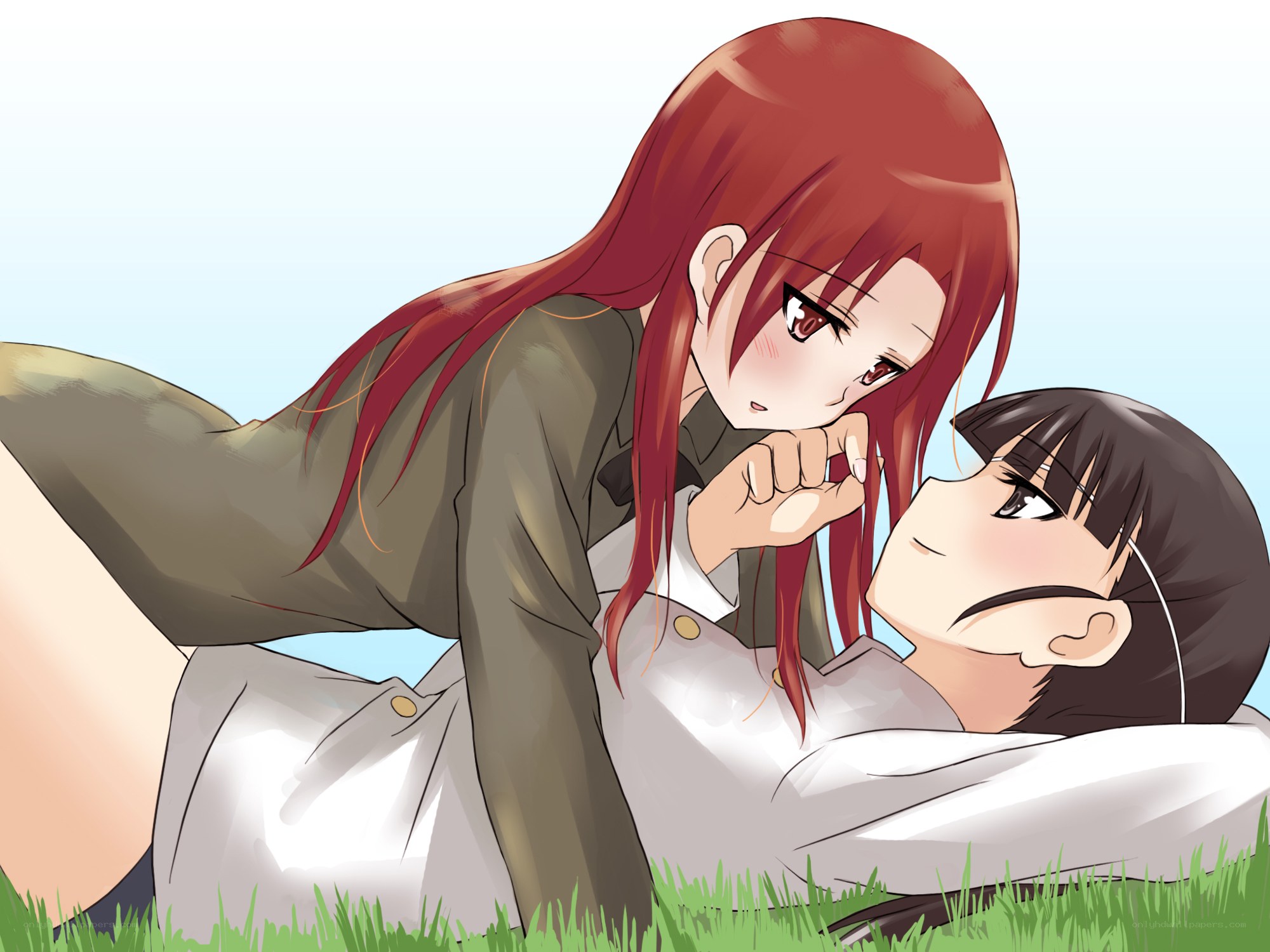 Red-haired girl leaning over another
