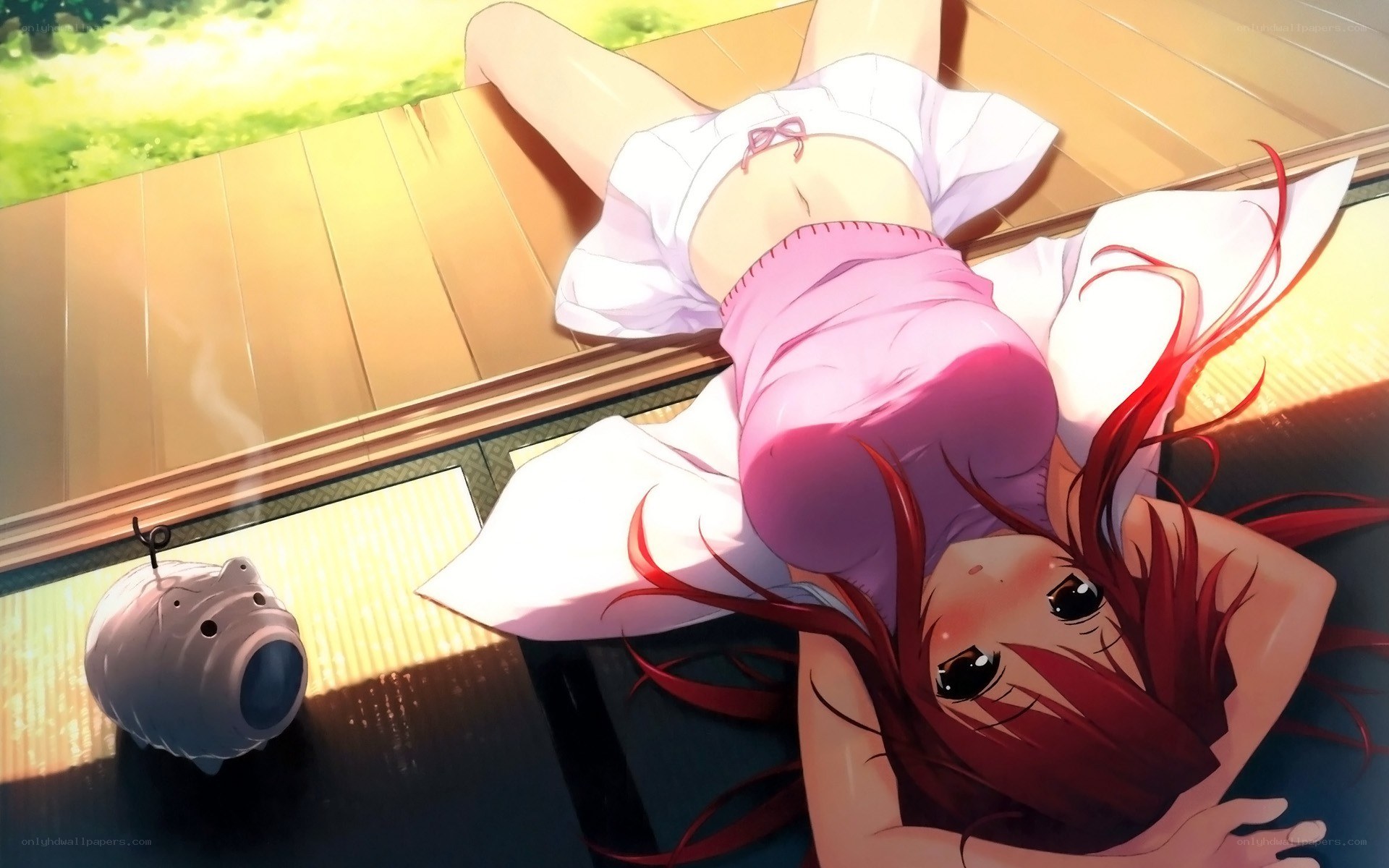 red-haired girl lying on floor