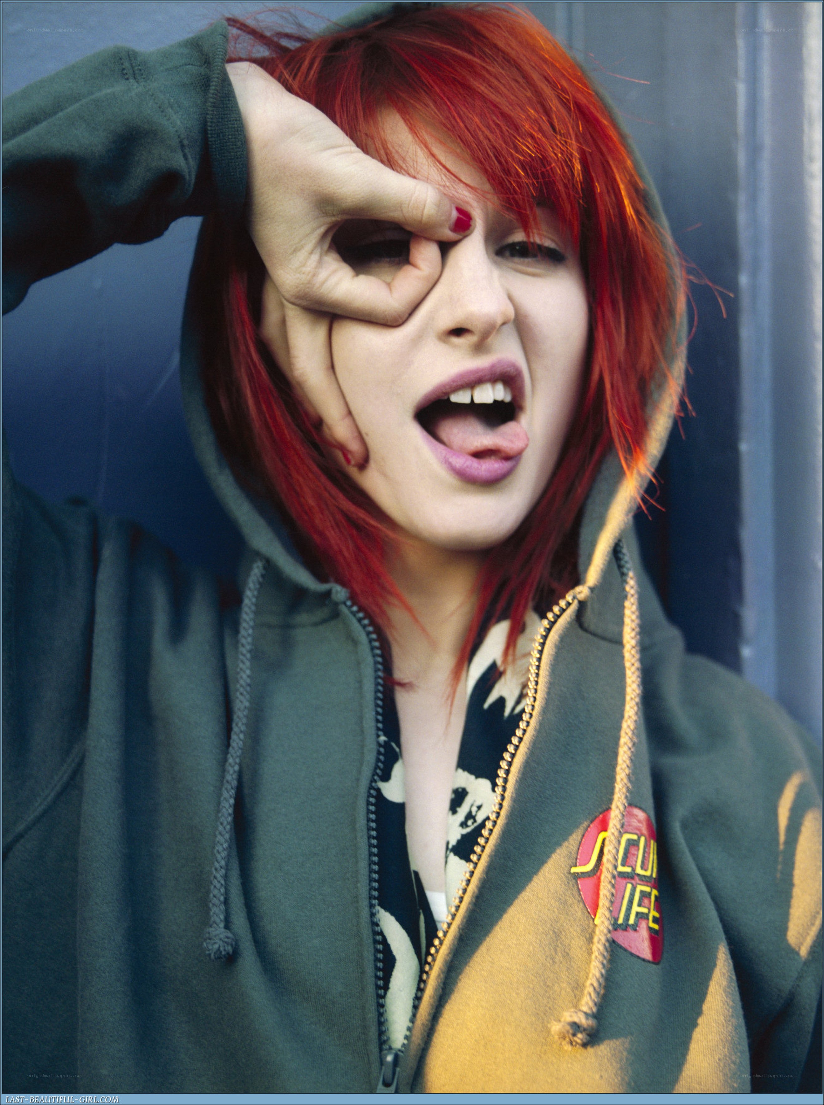 Red-haired girl making a face