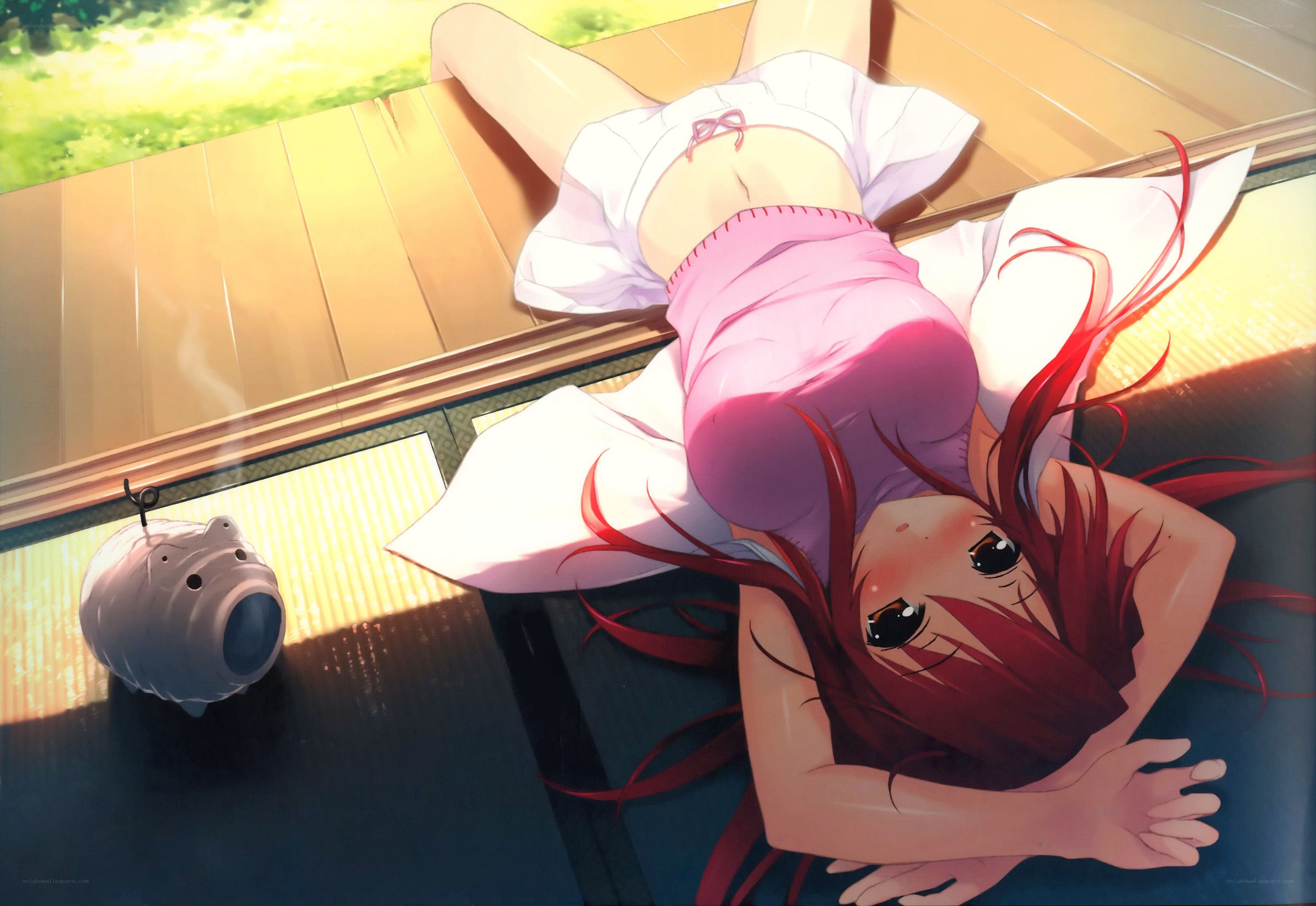 red-haired girl on floor