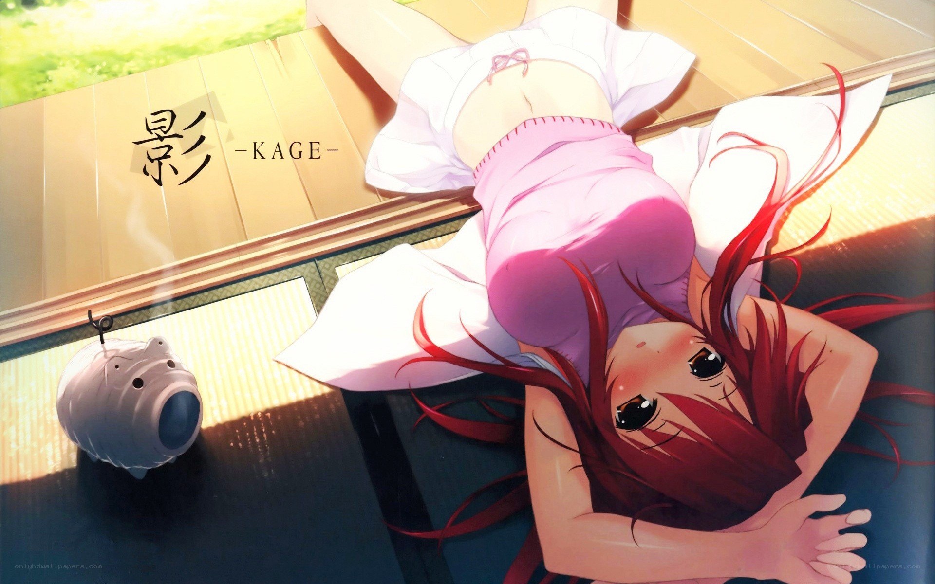 Red-haired girl on floor