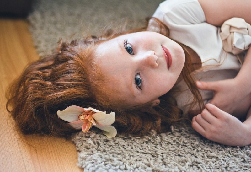 Red-haired Girl on Rug