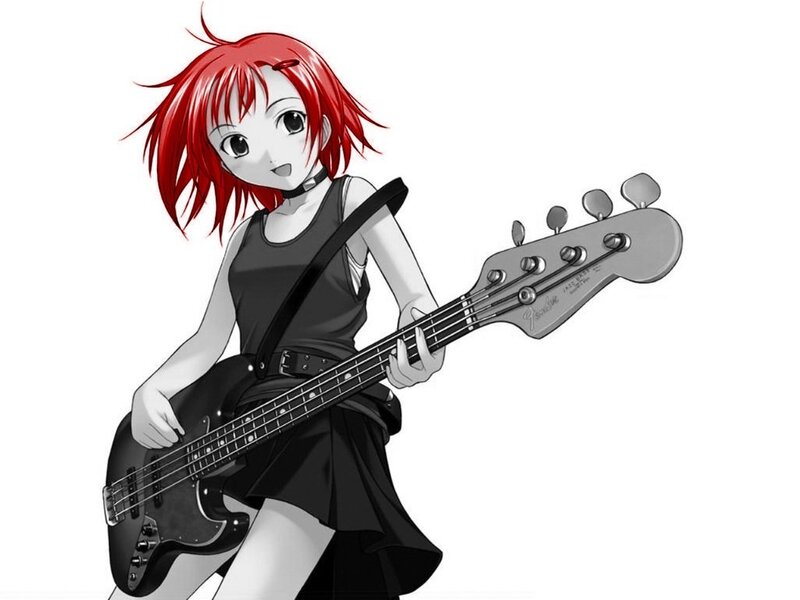 Red-haired girl playing bass guitar