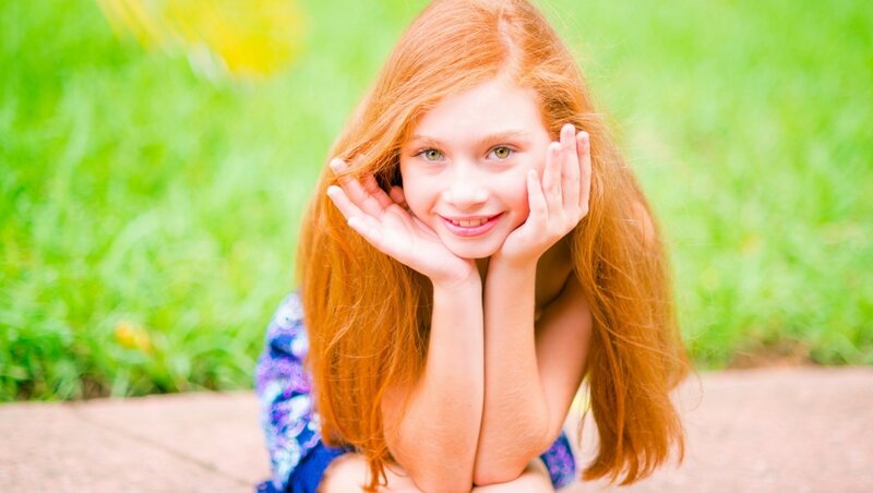Red-haired Girl Smiling — Green