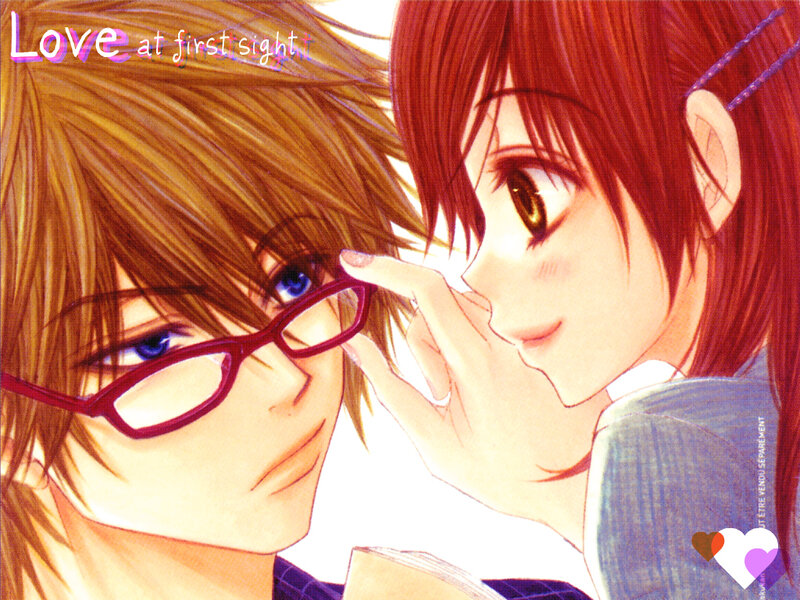 Red-haired Girl Touching Boy's Face