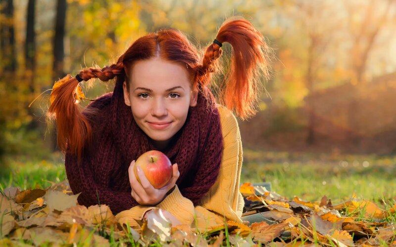 Red-haired Girl with Apple