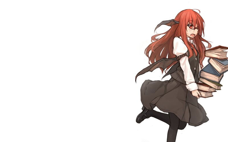 red-haired girl with books