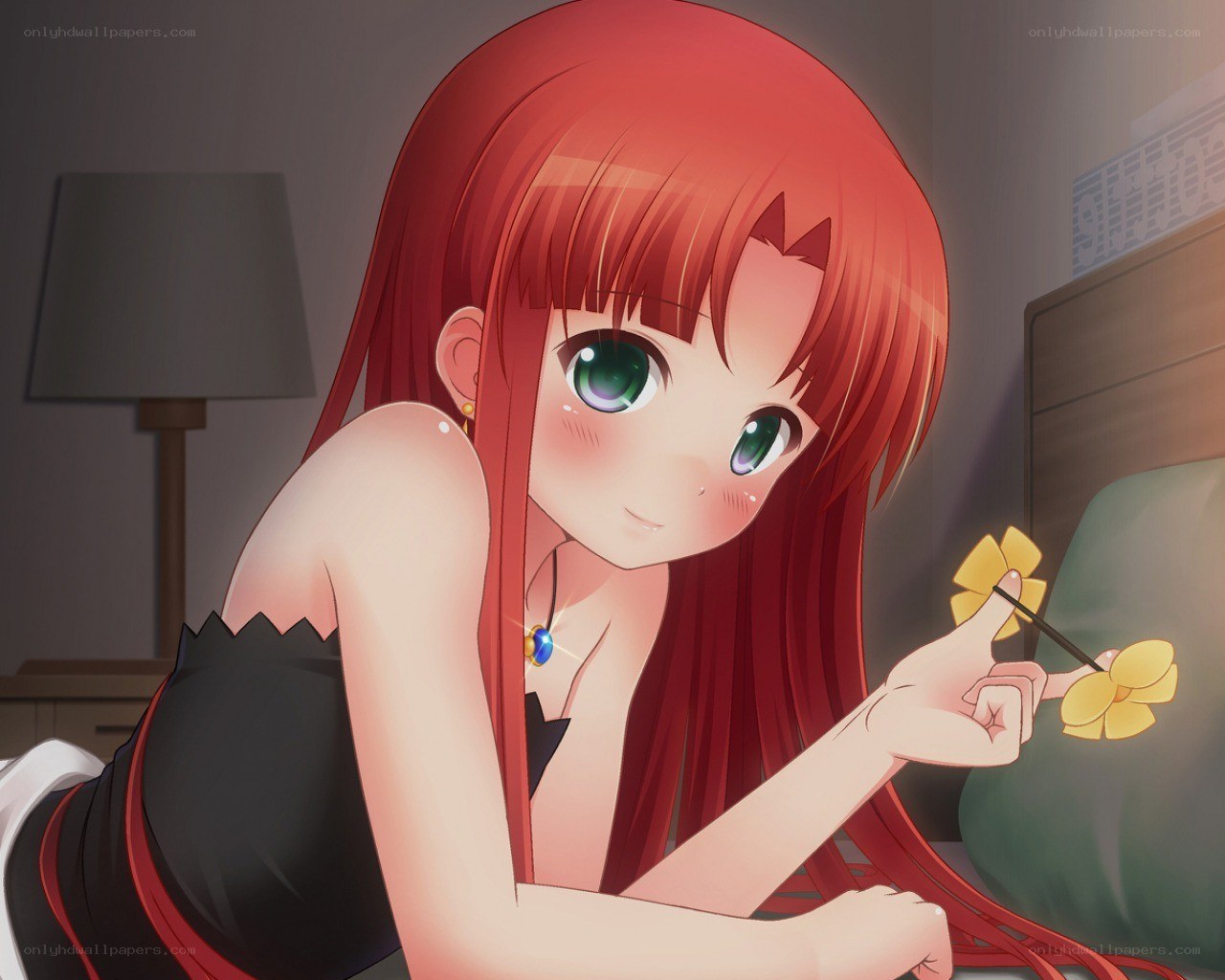 Red-haired girl with flower