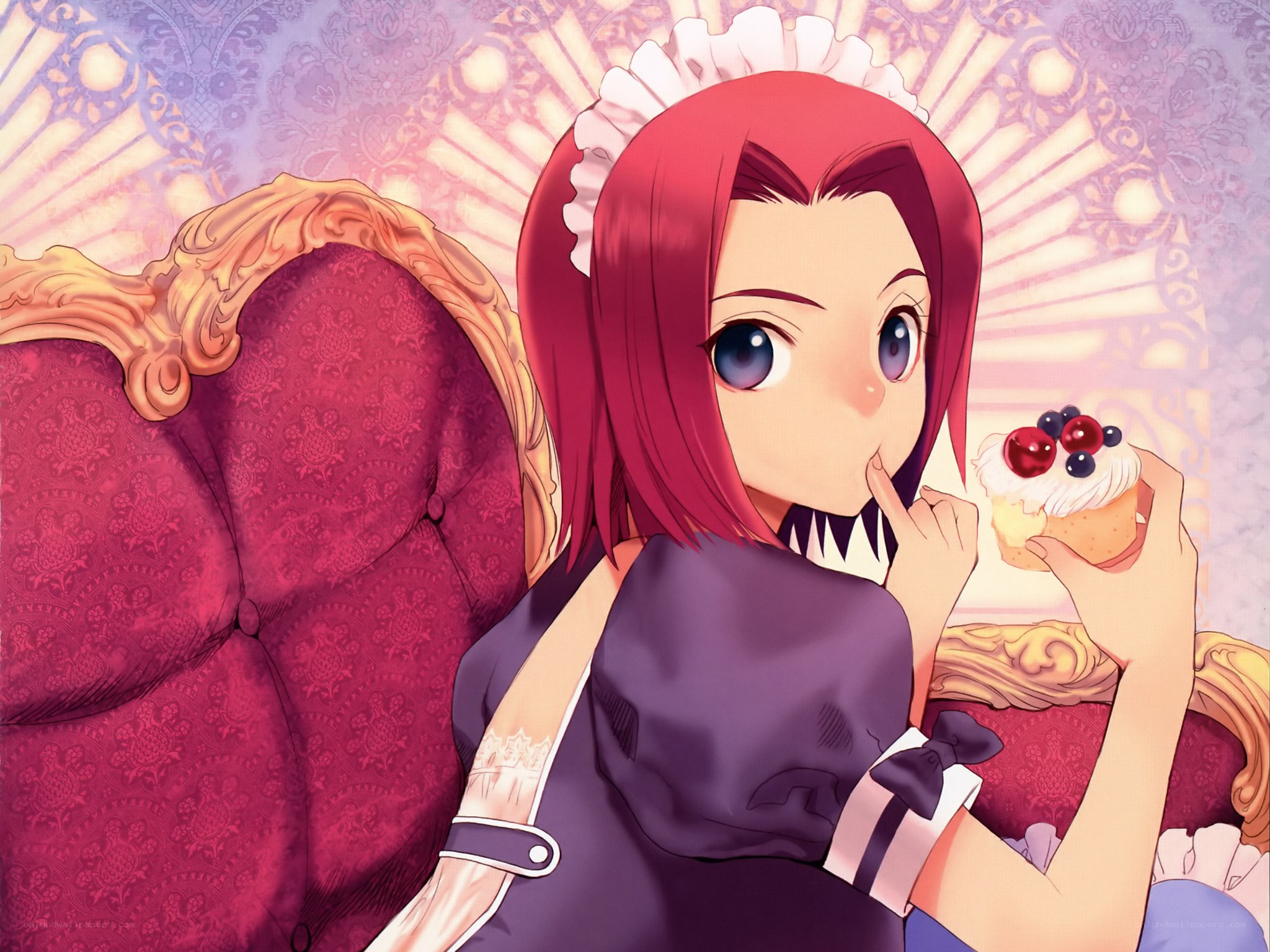 Red-haired maid with cupcake