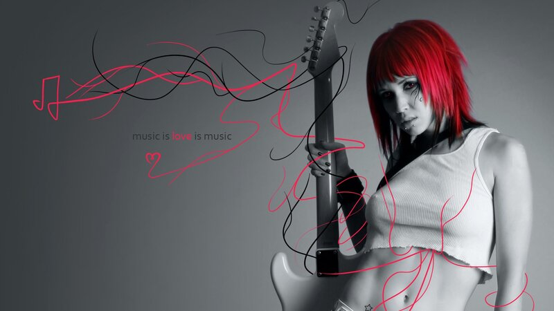Red-haired musician with guitar