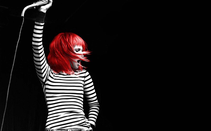 red-haired performer on stage