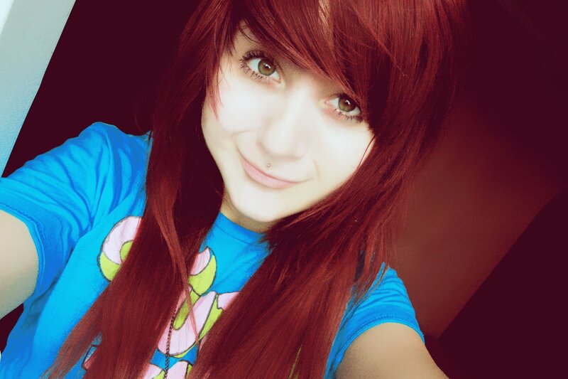red-haired person in blue shirt