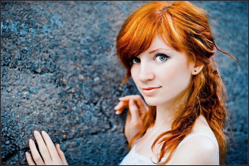 Red-haired Woman Against Wall