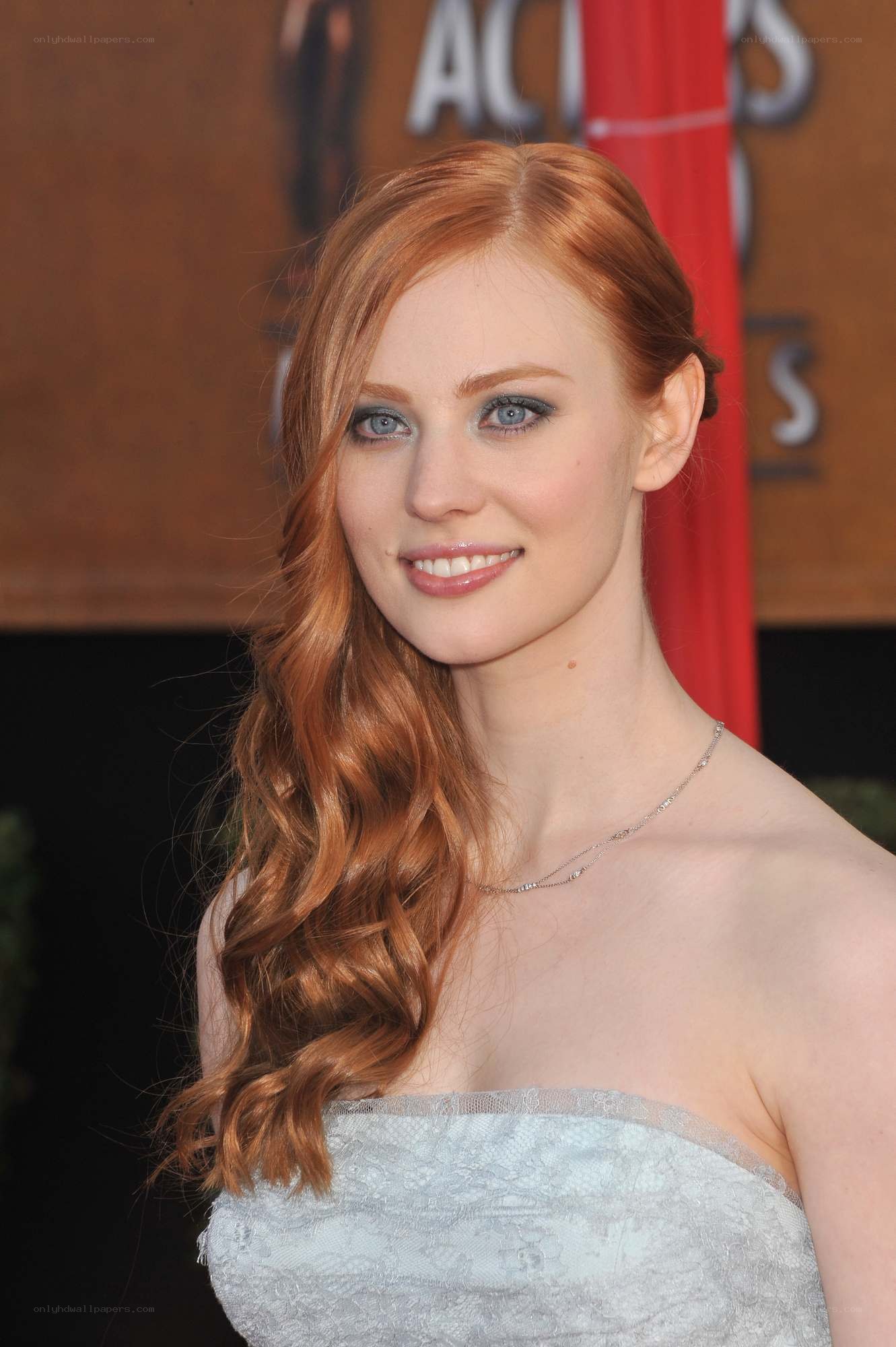 red-haired woman at event