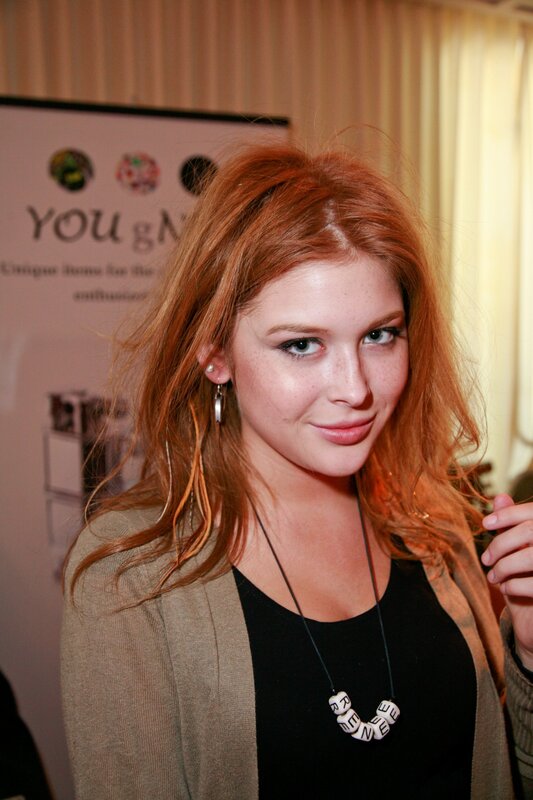 Red-haired woman at event