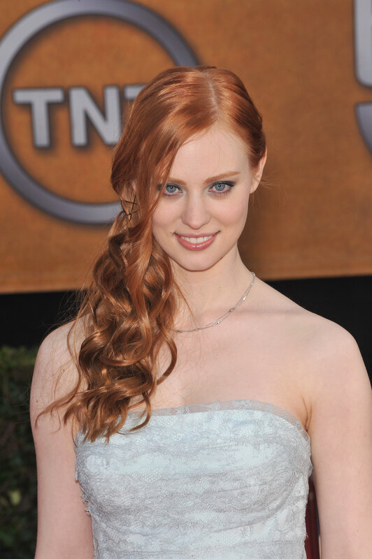 red-haired woman at event