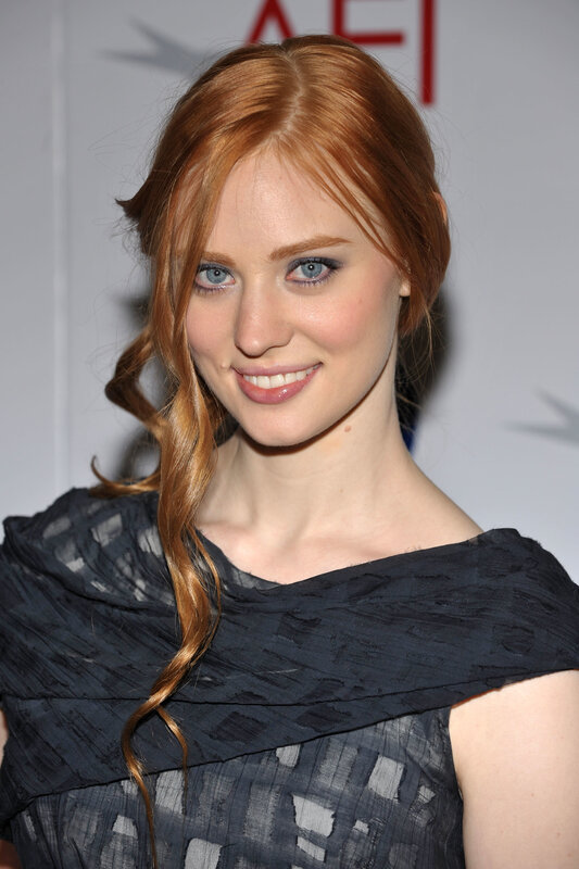 red-haired woman at event