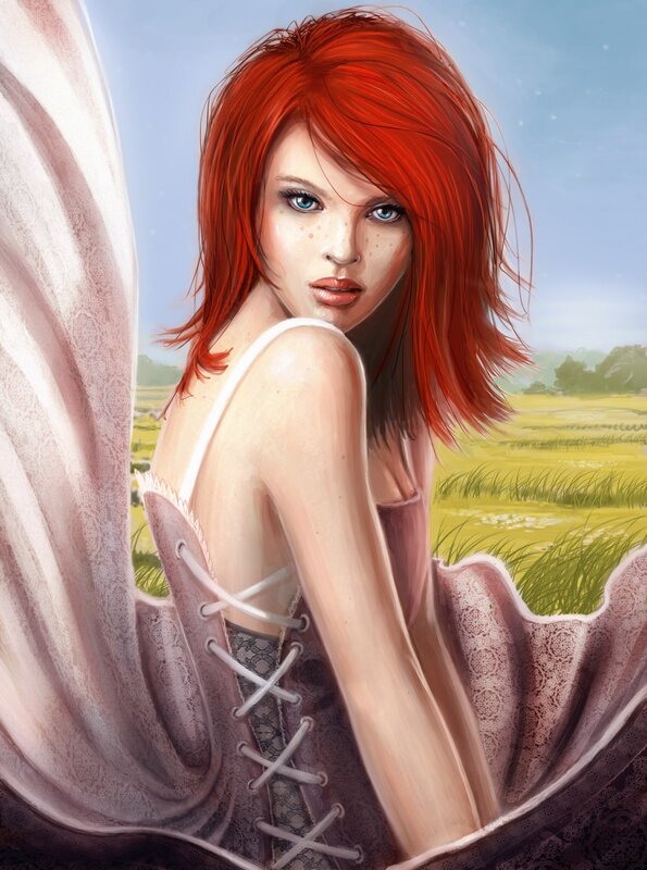 Red-haired woman in a field