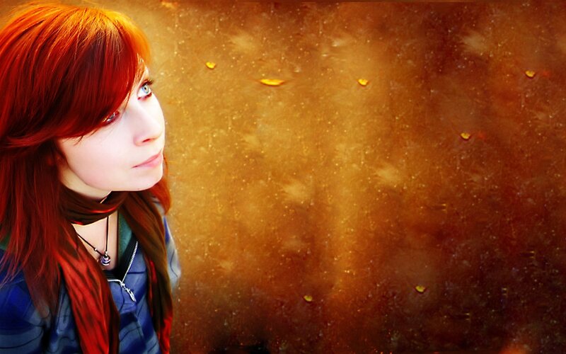 red-haired woman in autumn