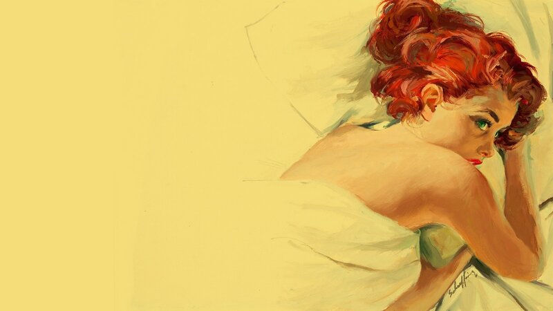 red-haired woman in bed