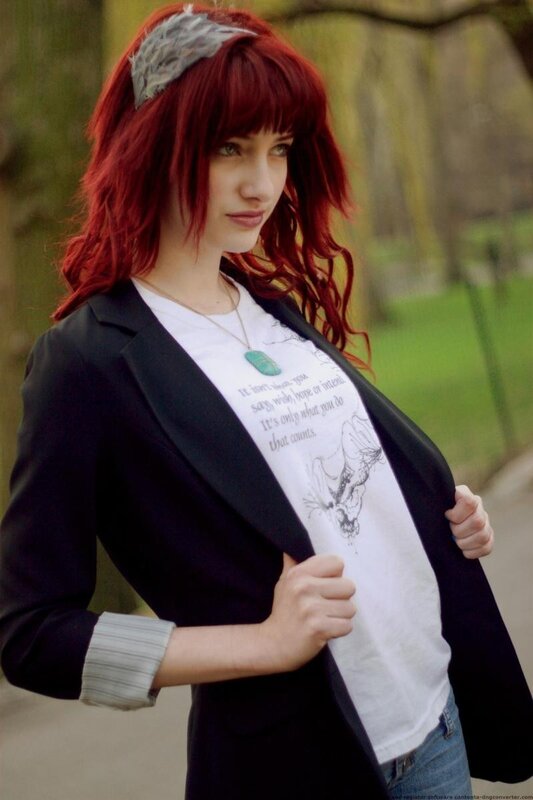 Red-haired woman in blazer