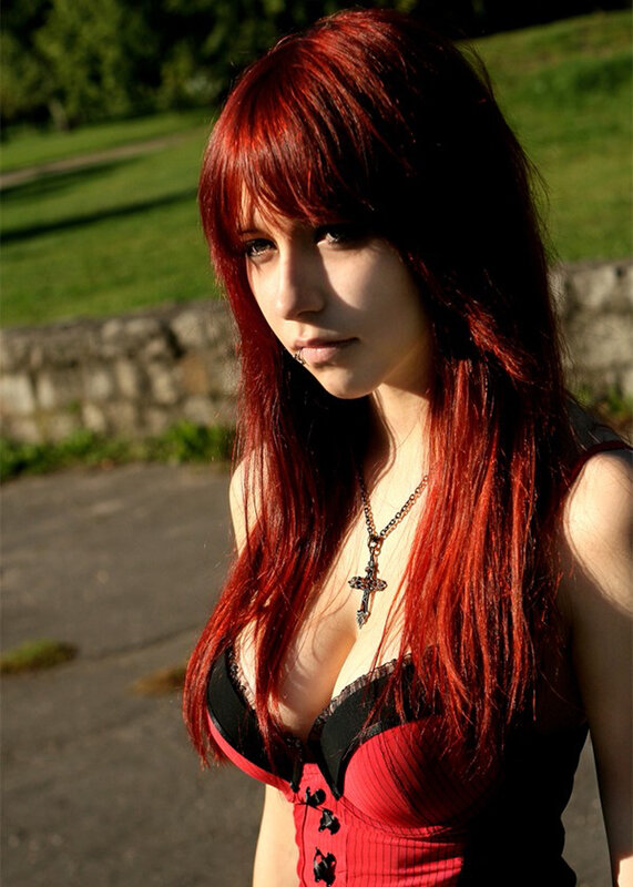 Red-haired woman in corset