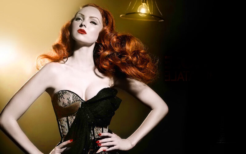 Red-haired woman in corset
