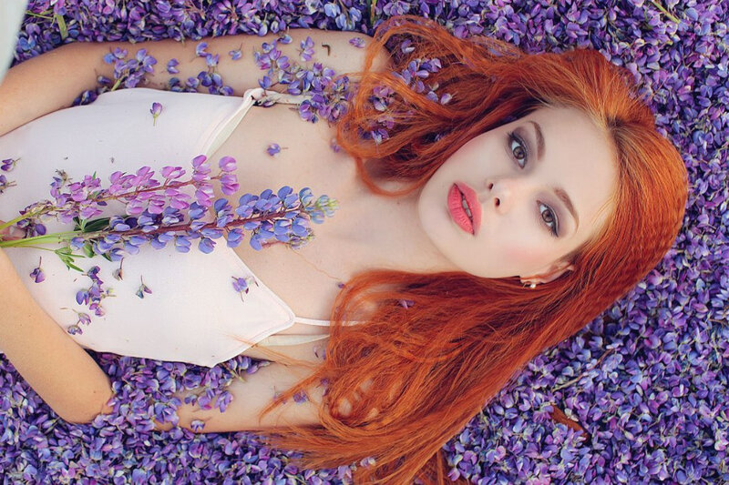 Red-haired Woman in Flowers