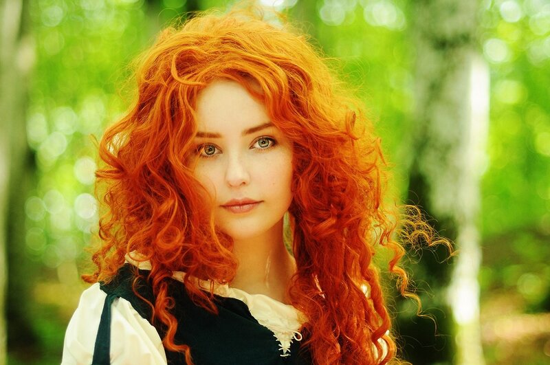 red-haired woman in forest