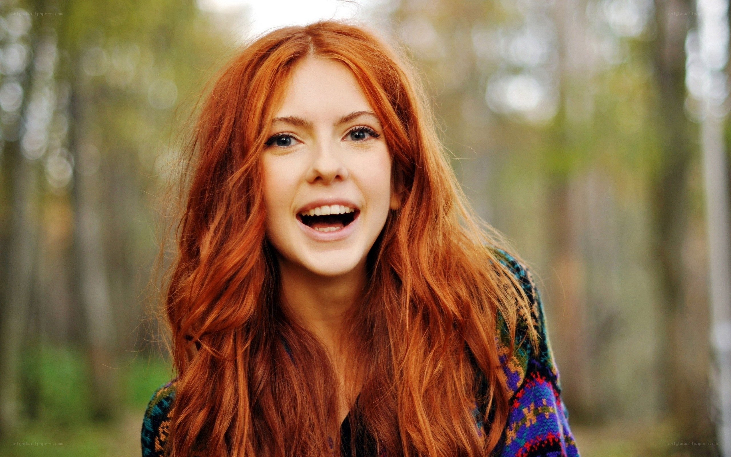 red-haired woman in forest