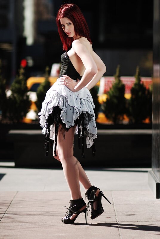 Red-haired woman in gothic dress