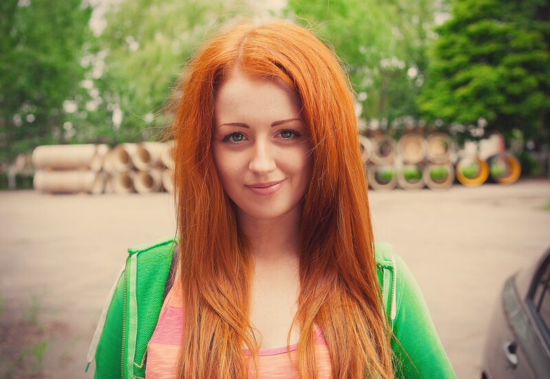 Red-haired Woman in Green Jacket — Red