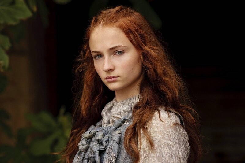 red-haired woman in lace dress