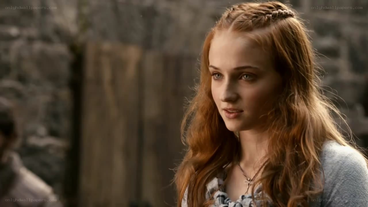red-haired woman in medieval setting