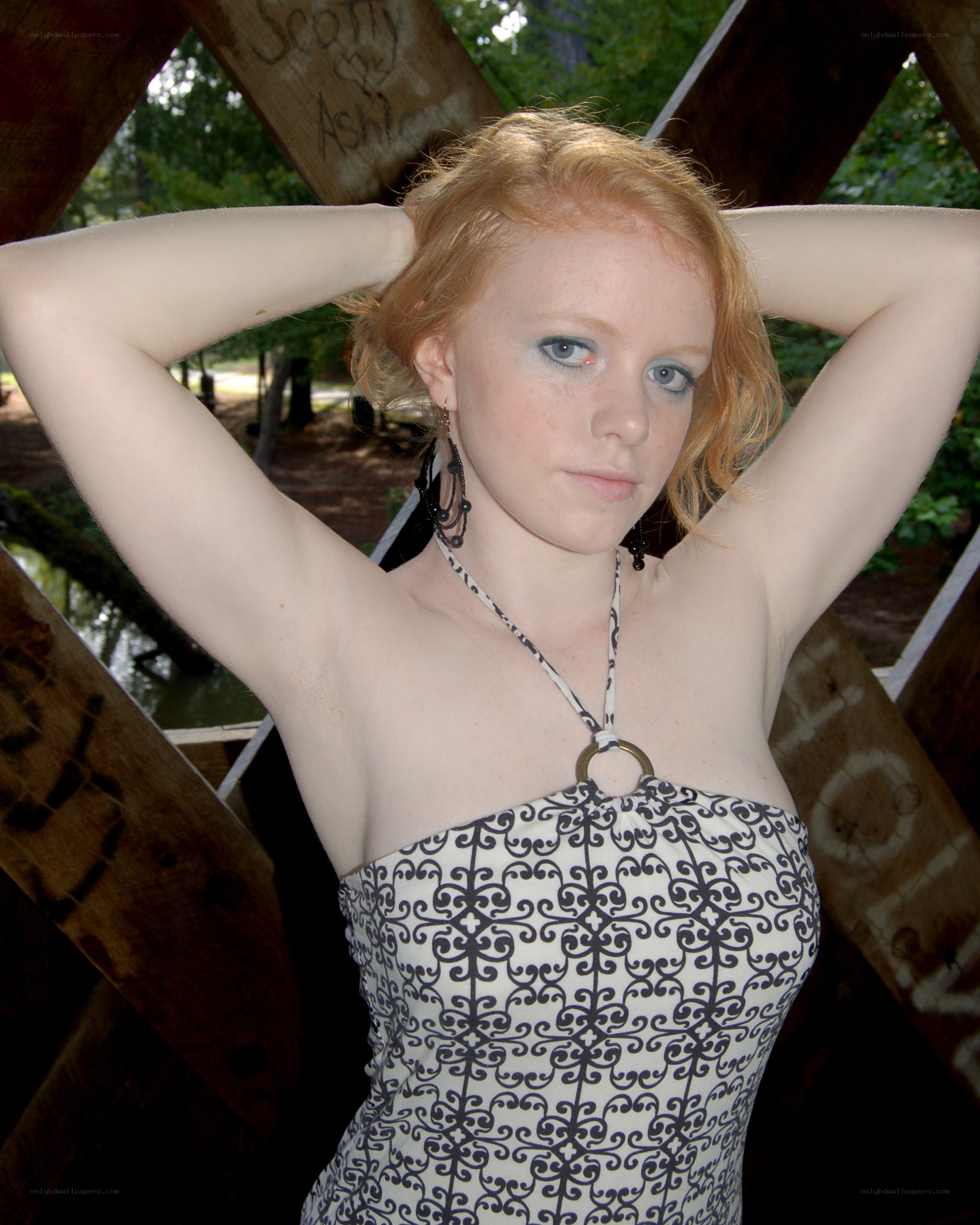 Red-haired woman in patterned dress
