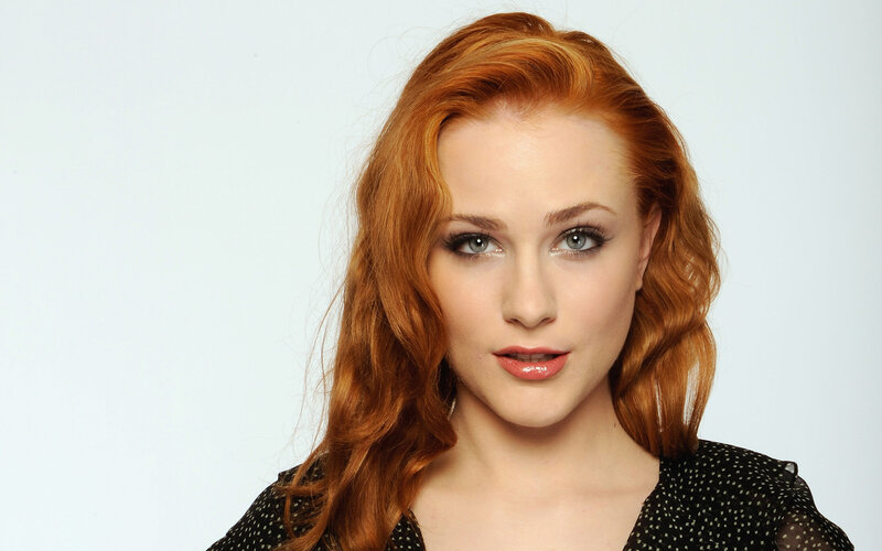 red-haired woman in polka-dot top