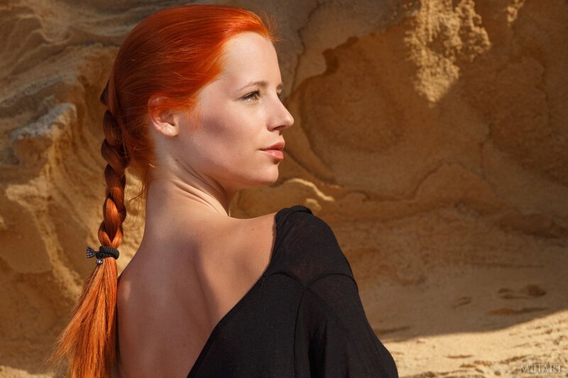 Red-haired woman in profile
