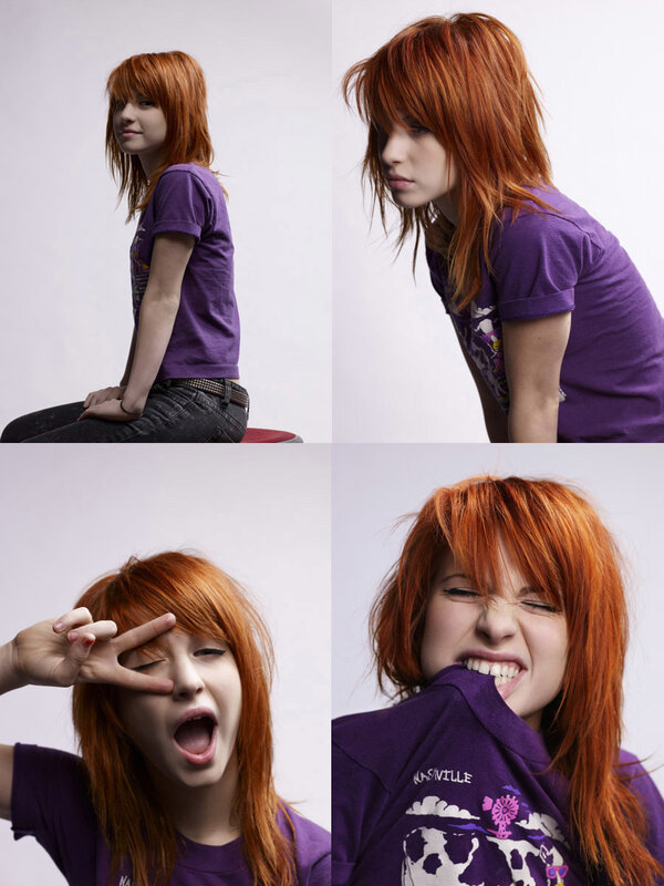 red-haired woman in purple shirt