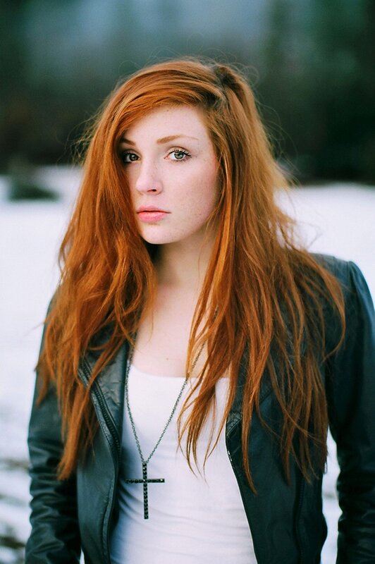 Red-haired Woman in Snow — Red, Serious