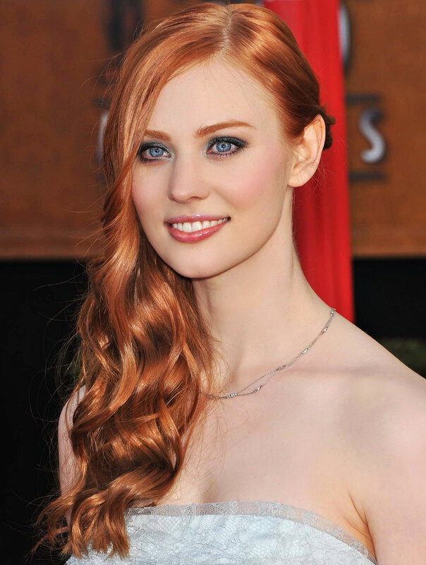 red-haired woman in strapless dress