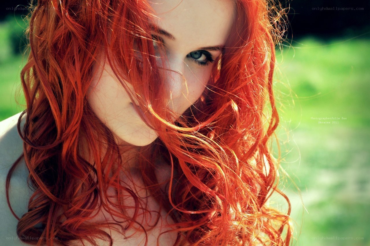 red-haired woman in sunlight