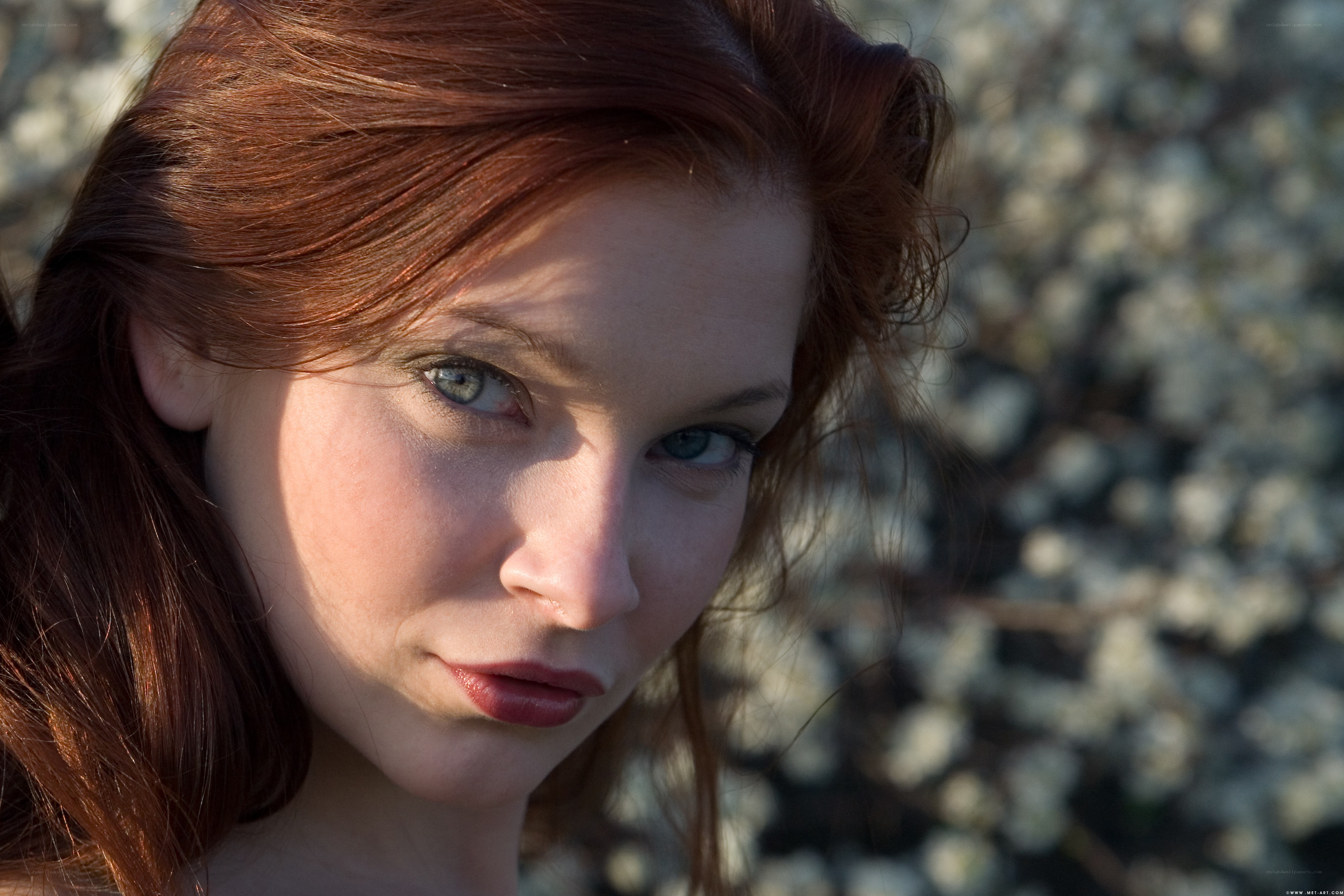 red-haired woman in sunlight