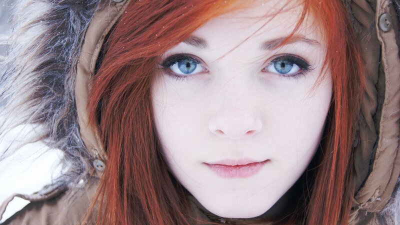 red-haired woman in winter coat