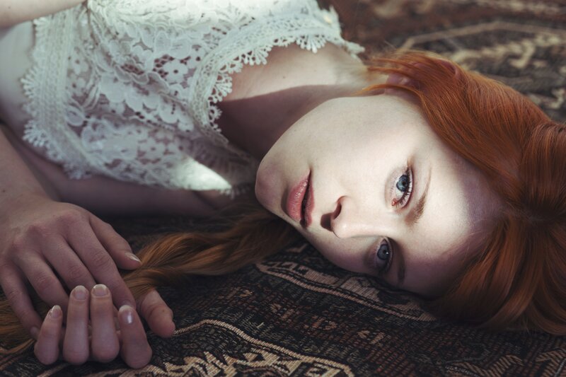 Red-haired Woman Lying — Red, Serene, Afternoon
