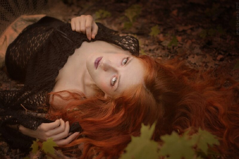Red-haired Woman Lying — Red, Serene