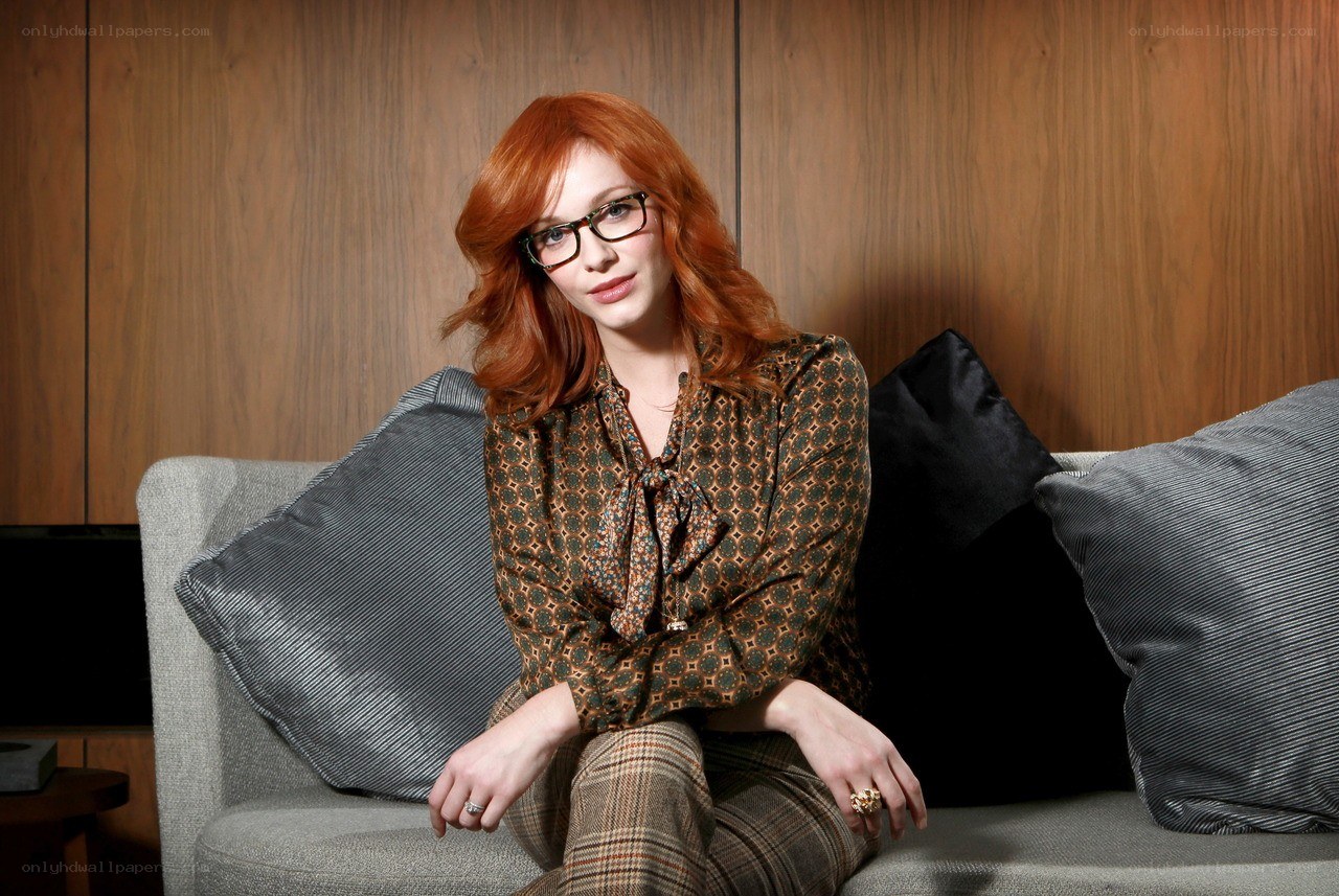 Red-haired woman on a couch