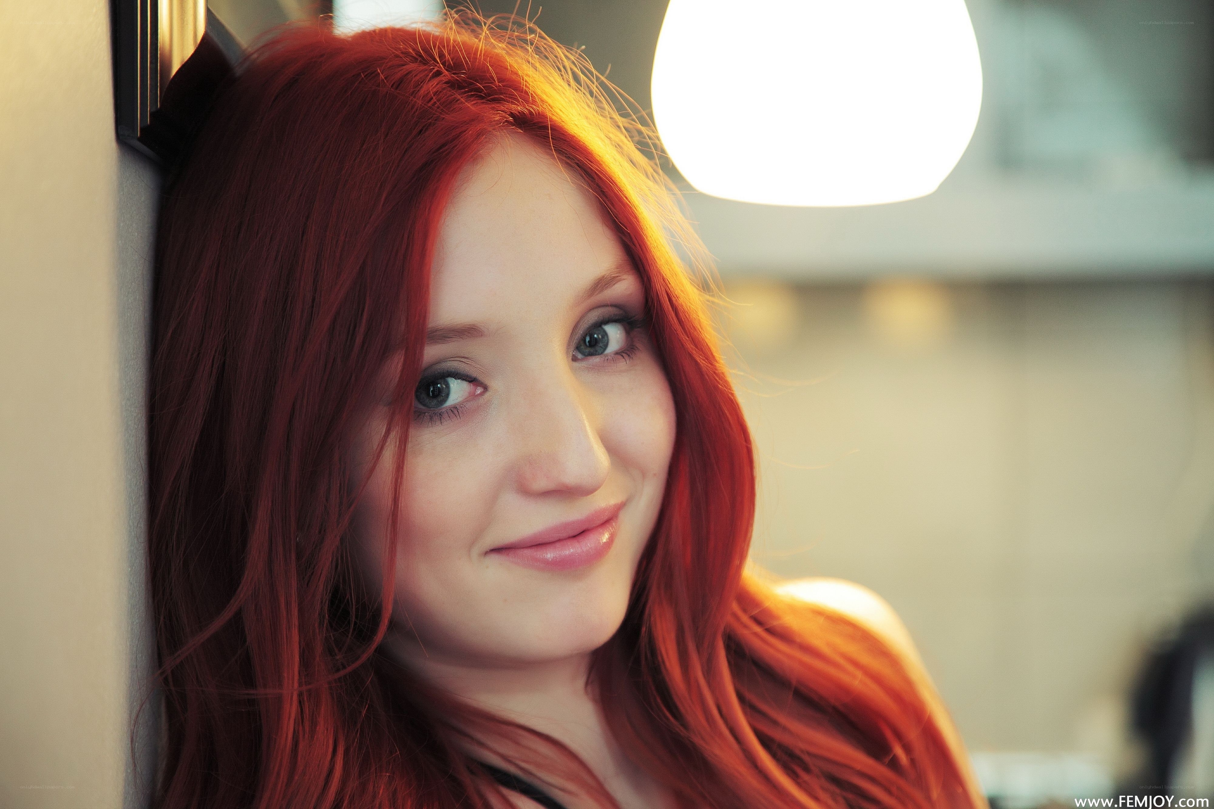 red-haired woman smiling