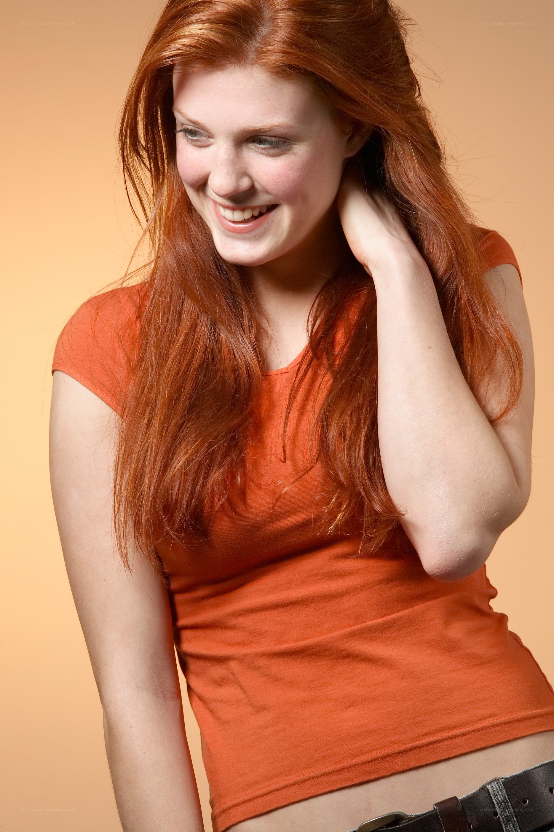 Red-haired woman smiling